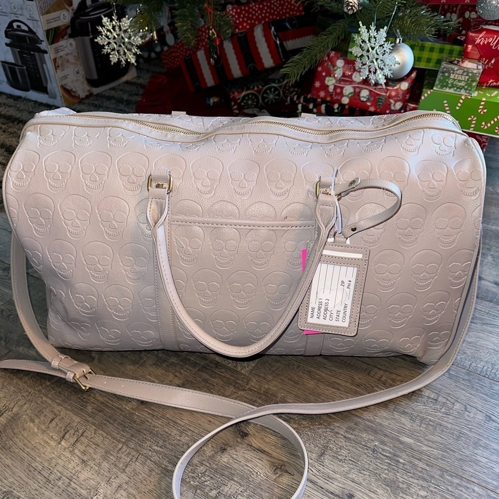 - Betsey Johnson Grey XOSpeedy  Skulltastic skull embossed duffel bag